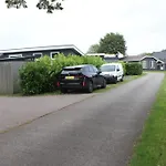 Met Vijverzicht Chalet Lathum